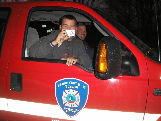 Firefighter Smyth Has His Picture Taken As He Takes A Picture